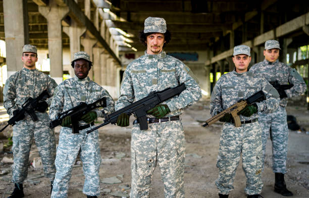 istock Soldiers with shotguns 1324862873