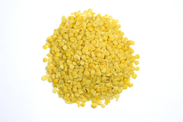 istock Yellow lentils on a white background. 1324864976