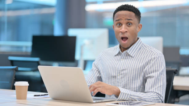 istock No Gesture with Head Shake by African Businessman at Work 1324865000