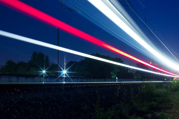 istock The electric train left behind a beautiful trail of headlights 1324865638