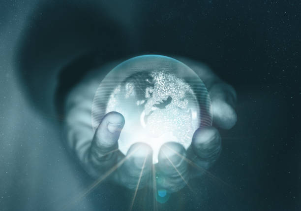 istock Global communication network concept, earth / globe, hand holding glowing planet, futuristic concept 1324872281
