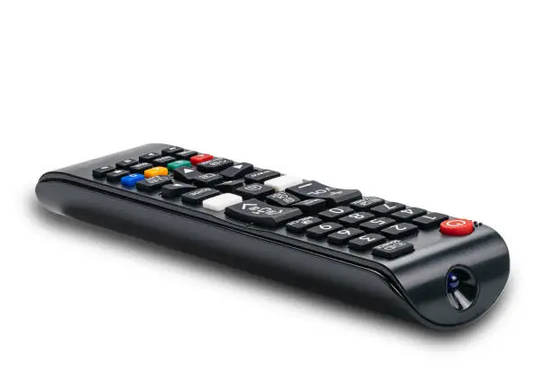 Photo of ide view of remote control for television on white background