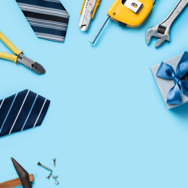 istock Top view design concept of Father's day with working tools on blue background. 1324878945