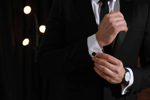 istock Man wearing stylish suit and cufflinks, closeup. Space for text 1324881191
