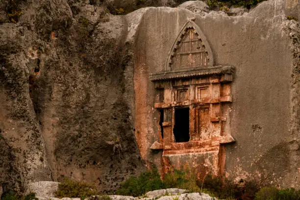 Photo of Beautiful old lycian rock tomb in Antiphellos ancient city at location Kas, Antalya