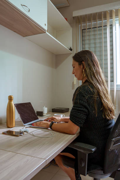 istock woman studying at home 1324884033