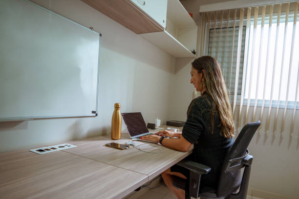 istock woman studying at home 1324884059