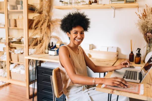 istock Young jewelry artesian with laptop 1324886694