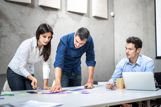istock Coworkers doing a meeting at the office 1324886721