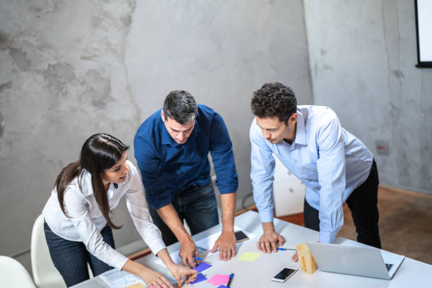 istock Coworkers doing a meeting at the office 1324887384
