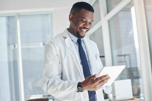 istock Shot of a young doctor using a digital tablet in an office 1324887398