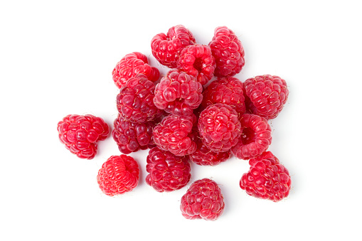Bunch of ripe red raspberries isolated on white background. View from above