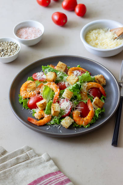 istock Caesar salad with shrimps. Healthy eating. Diet. Recipes. 1324890802