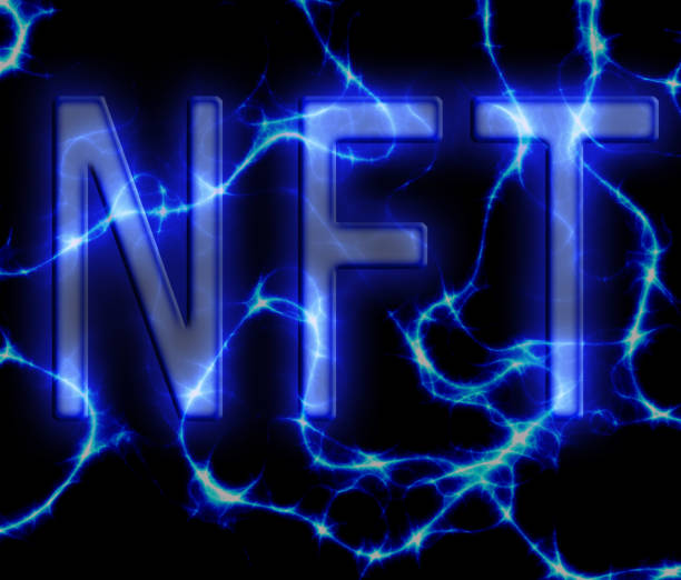 istock NFT ( Non-Fungible Token ) text on electricity blue and black background 1324892019
