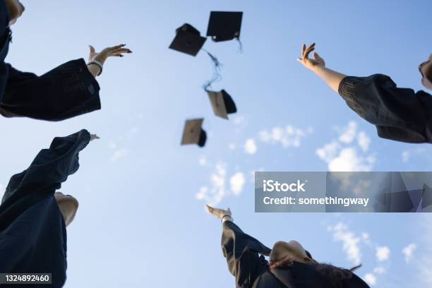 A Group Of Asian Graduates Stock Photo - Download Image Now - Graduation, University, Hat