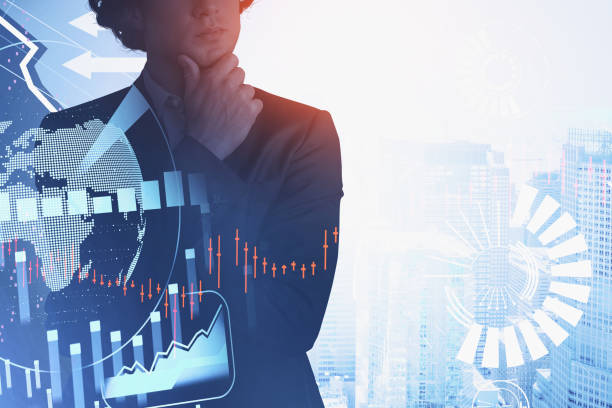 istock Handsome trader in suit in crossed arms pose dreaming about posi 1324892478