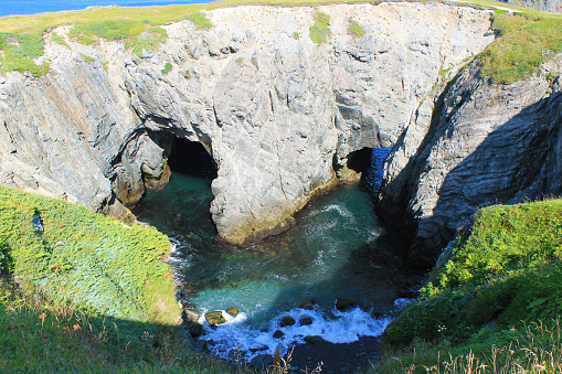 The natural rock formation known as the Dungeon, Dungeon Provincial Park, Bonavista, Newfoundland.