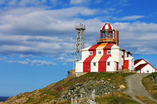 Bonavista Lighthouse, Bonavista Newfoundland. Sunny summer day, blue sky, light cloud.
