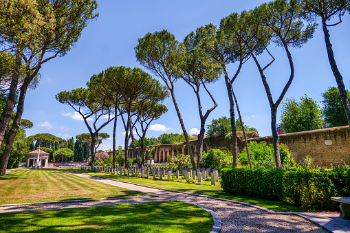 Rome, Italy, June 15 -- The Rome War Cemetery of Testaccio, a military cemetery where there are the graves of dozens of soldiers from the Commonwealth countries who fell in the Second World War in Italy. This cemetery, built in 1947, stands close to the ancient walls built by the emperor Aurelius. Present in the topography of Rome since the imperial era due to the presence of the river port on the Tiber, Testaccio is one of the oldest districts of the Italian capital. Testaccio maintains a strong popular identity, where to find the true soul of Rome. Image in High Definition format.