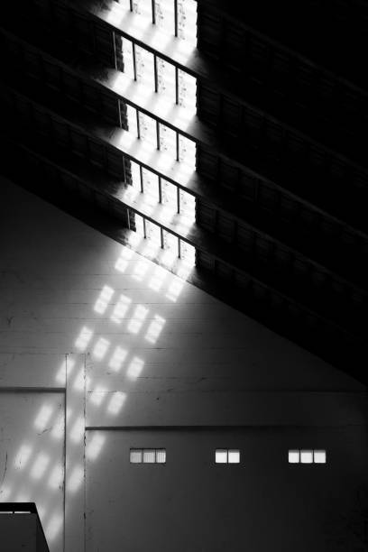 istock Abstract black and white building with light and shadow. 1324893495
