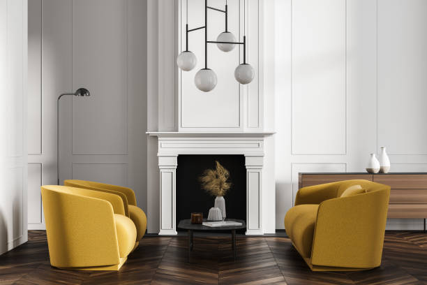 istock White room interior with fireplace, armchairs and sofa on parquet 1324894411