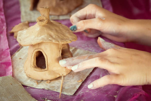 istock Having fun with colorful modeling clay. Creative kids molding at home. 1324896612