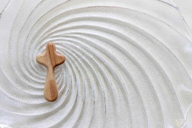 wood cross on glass background