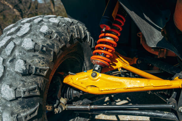 amortiguador de coche atv de cerca - shock absorber car part of motorcycle fotografías e imágenes de stock