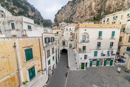 Amalfi, Italy - August 19, 2019: View from the sea to the town of Amalfi in Italy on the coast of the Tyrrhenian Sea