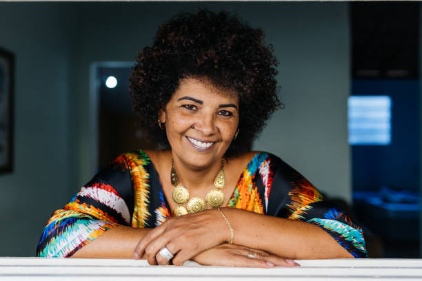 istock brazilian woman at the window 1324904277