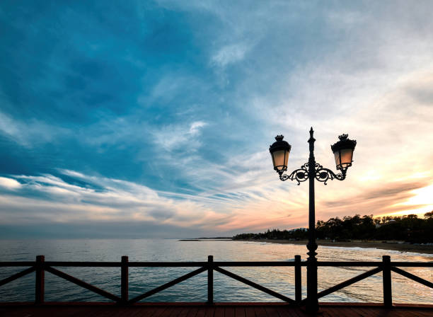 istock Sunset life from jetty in Marbella, Costa del Sol, Spain 1324908203