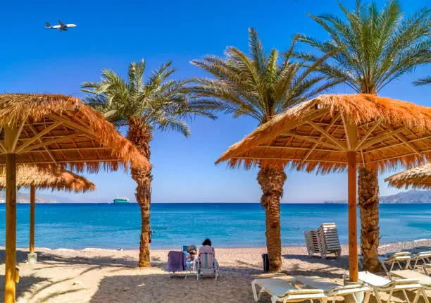 Photo of Morning on sandy beach of the Red Sea in Eilat