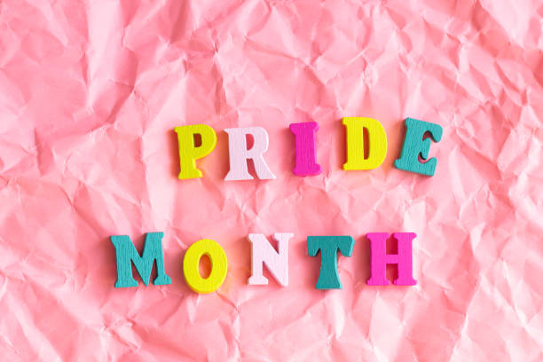 istock Text pride month on pink background LGBTQ party decor 1324917104