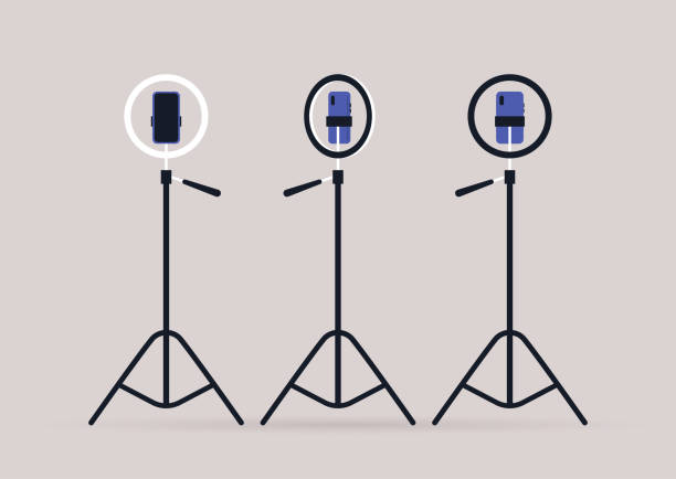 An isolated tripod with a ring light and a smartphone installed inside it, three points of view, side, back, and front An isolated tripod with a ring light and a smartphone installed inside it, three points of view, side, back, and front tripod stock illustrations