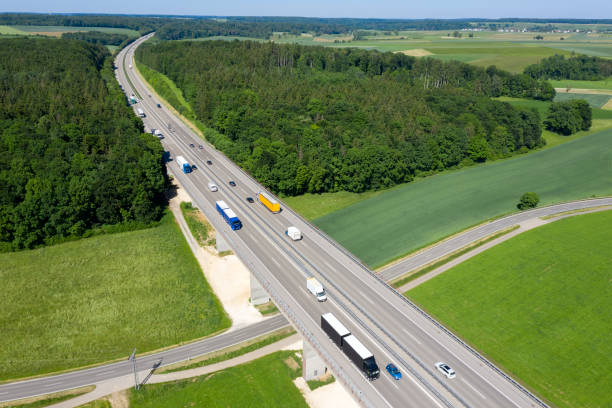 istock Highway with trucks, aerial view 1324921299