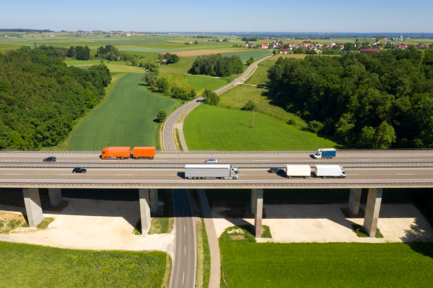 istock Trucks on Highway, Aerial View 1324921722