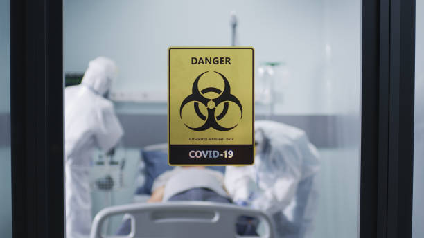 istock Doctors working with patient in coronavirus ward 1324931782