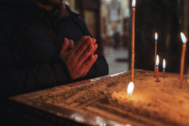 istock Praying at the church 1324933969
