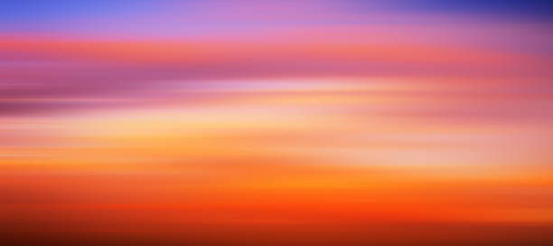 istock Panoramic landscape of bright red orange sunrise sunset 1324937929