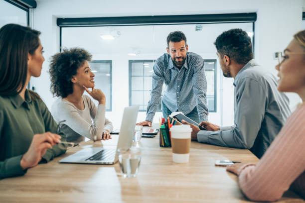 istock Team of professionals during a meeting. 1324941175