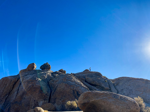 Hiking and exploring in the rocks of Alabama Hills.