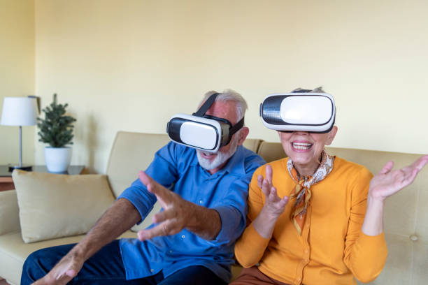 istock A Couple of Retirees is Gesturing and Smiling While Playing a Games on VR System. 1324954298