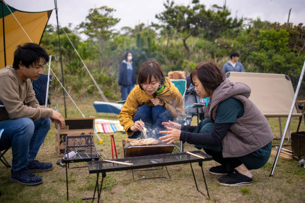 istock Family eating foods at camp 1324956565