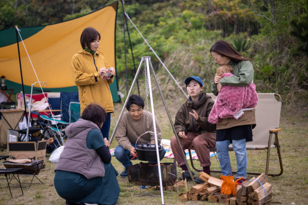 istock Japanese families preparing for dinner at camp 1324956622