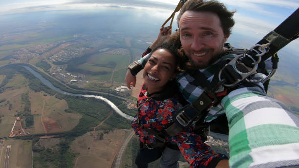 istock Beautiful black woman practicing skydiving. 1324958548