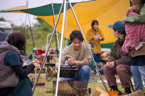 istock Japanese families preparing for dinner at camp 1324958637