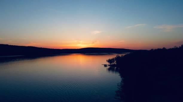 Otisco Sunset Sunset captured on Otisco lake finger lakes stock pictures, royalty-free photos & images