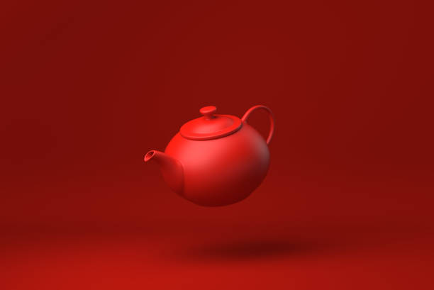 teiera rossa che galleggia su sfondo rosso. idea concettuale minima creativa. monocromatico. rendering 3d. - chinese tea teapot isolated tea foto e immagini stock