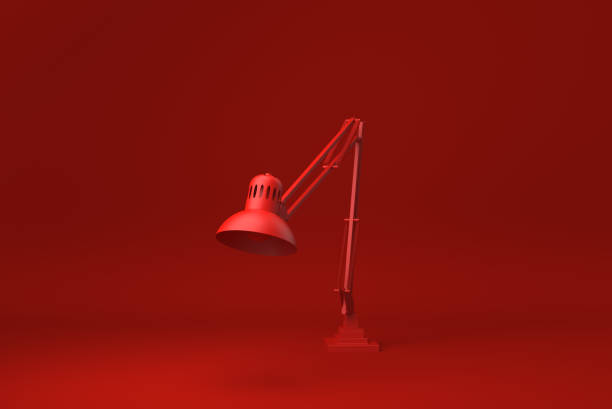 istock Red Desk lamp in Red background. minimal concept idea creative. monochrome. 3D render. 1324963049