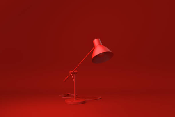 istock Red Desk lamp in Red background. minimal concept idea creative. monochrome. 3D render. 1324963114